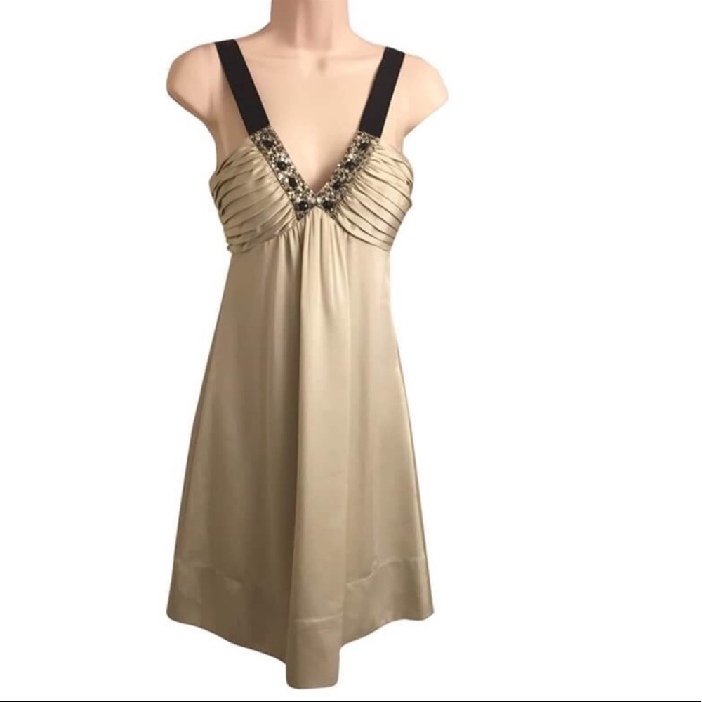Perfect condition BCBG gold and beaded cocktail dress. Worn once. Size 2.